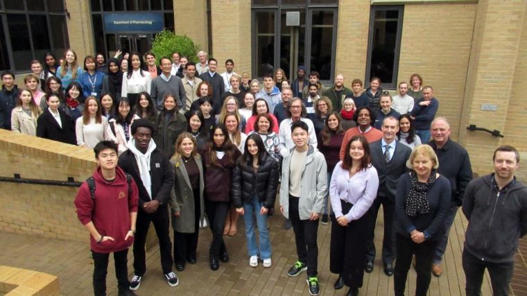 Members of the Department of Pharmacology, including staff, students and visitors, photographed outside the building on Friday 14 October 2022